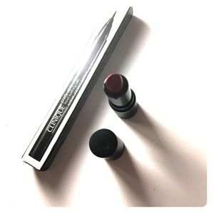 New makeup—eyeliner, mini lipstick, setting spray